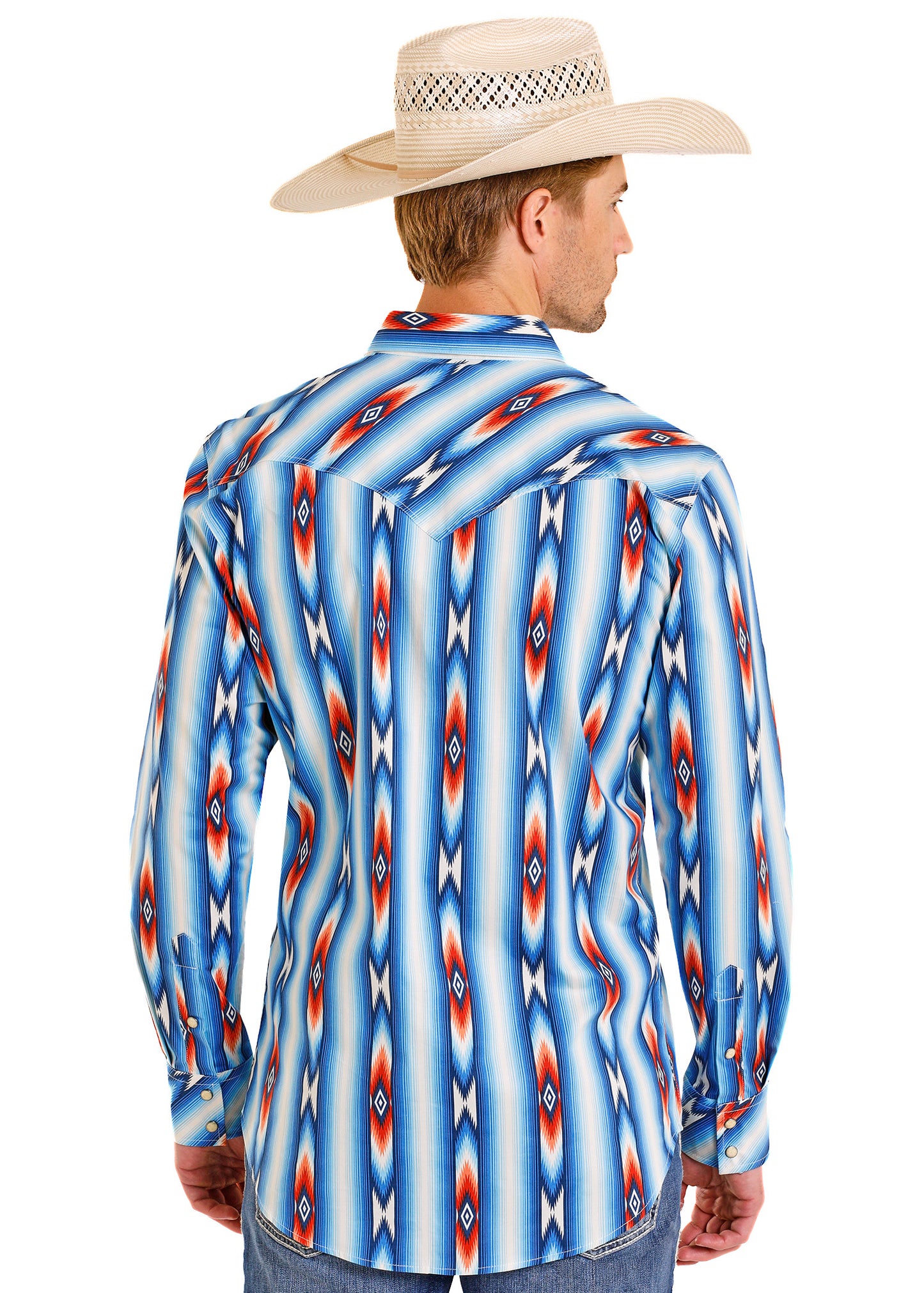 Man wearing a colorful patterned shirt with a straw hat on a white background