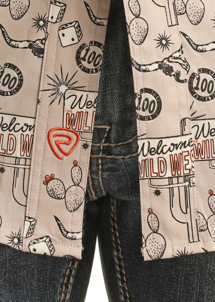 Close-up of the Rock & Roll Denim Tattoo Short Sleeve Snap Shirt - S, slim fit with visible stitching and red embroidery, displaying a Wild West pattern of cacti, dice, money, and text. Paired with blue denim jeans.