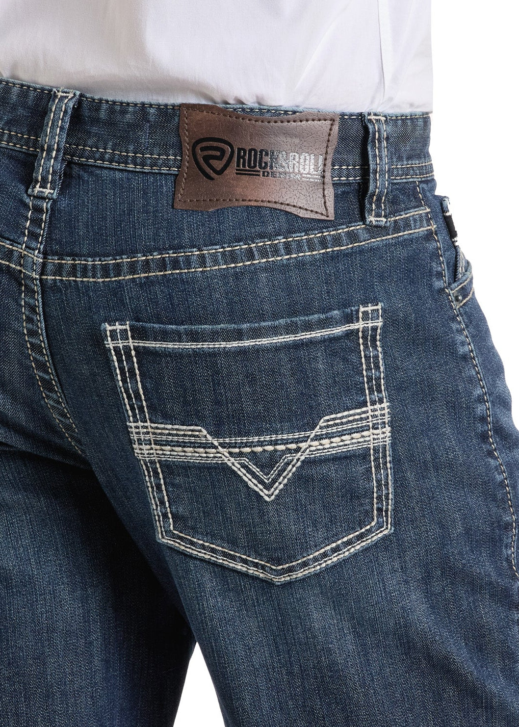 Blue jeans with a brand logo on the back pocket against a white background