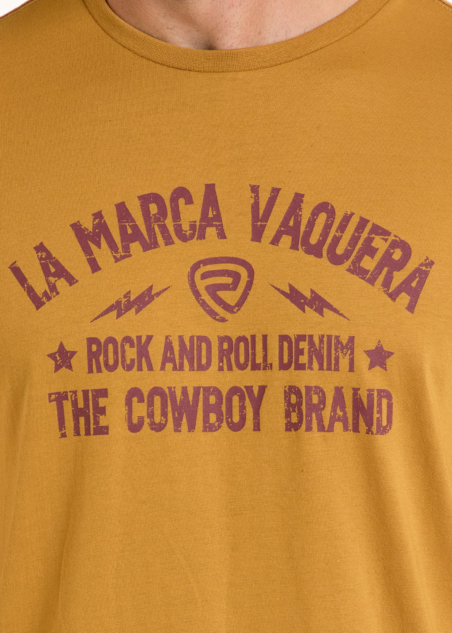 The La Marca Vaquero Graphic Tee by Rock & Roll Denim stands out with distressed purple text and bold star and lightning bolt graphics on a comfortable mustard yellow shirt.
