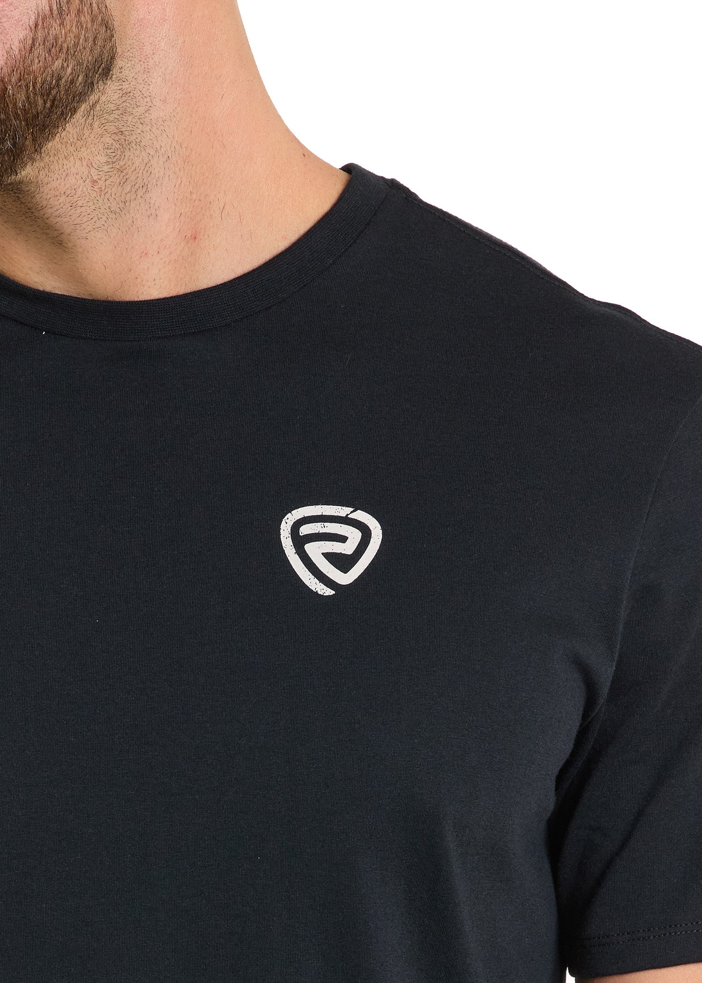 Close-up of a person wearing the Bronco Rider Unisex Graphic Tee by Rock & Roll Denim, showcasing a small white circular geometric logo on the left chest. The person's neck and partial jawline are visible, emphasizing this classic tee.