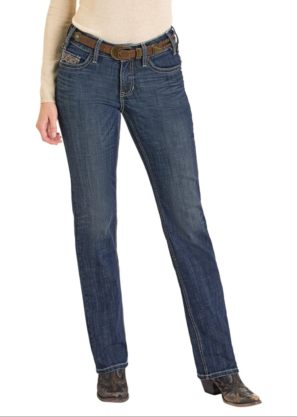 A person wearing Rock & Roll Denim Mid Rise Leather Embroidered Pocket Modest Bootcut Jeans stands with one leg slightly forward. Their head is not visible in the image.