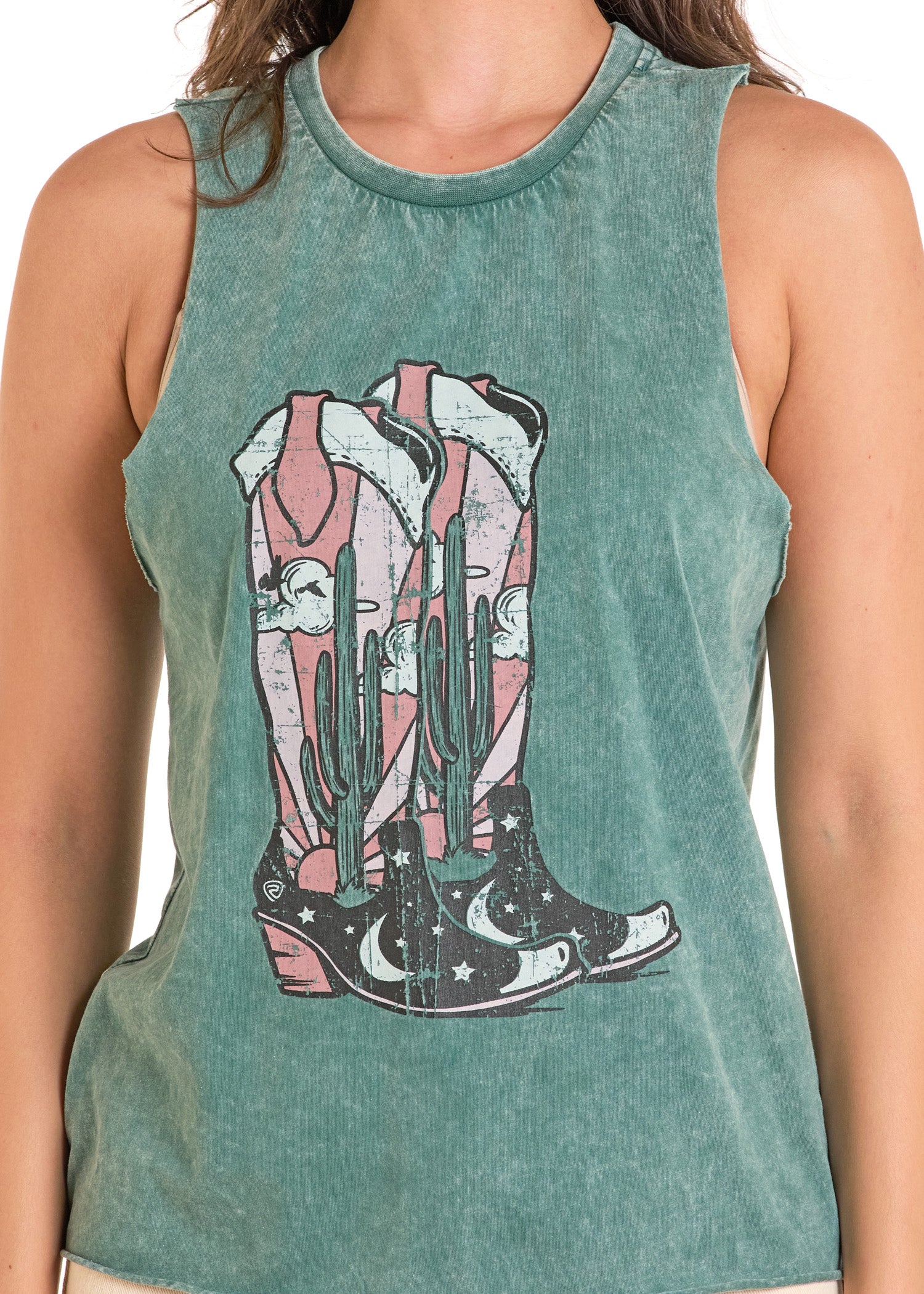 A person wears the Rock & Roll Denim Desert Boots Graphic Tank Top, featuring two cowboy boots with cacti, clouds, and a moon. The person's face is not visible.