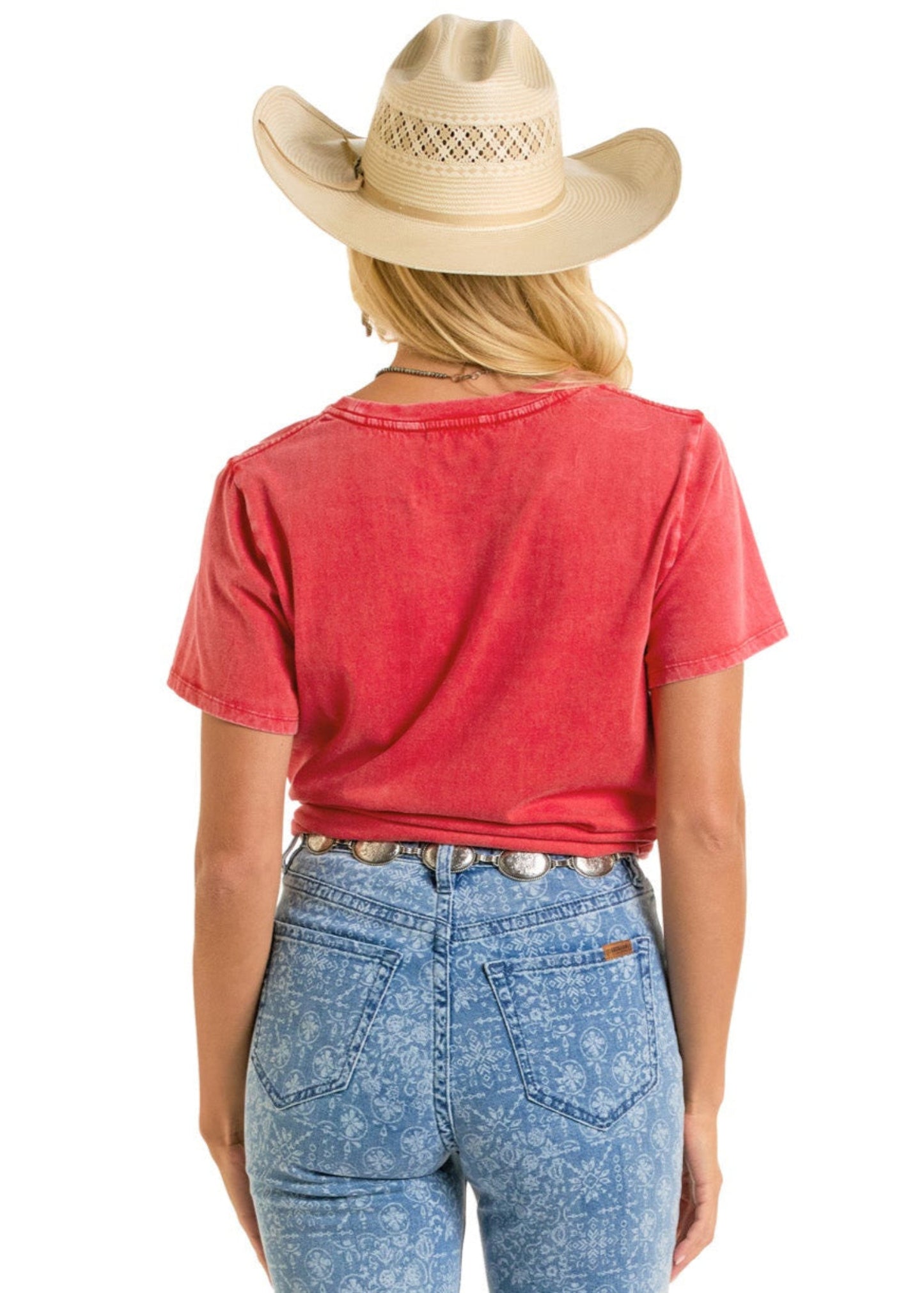 Person wearing a red shirt and blue jeans with a cowboy hat on a white background