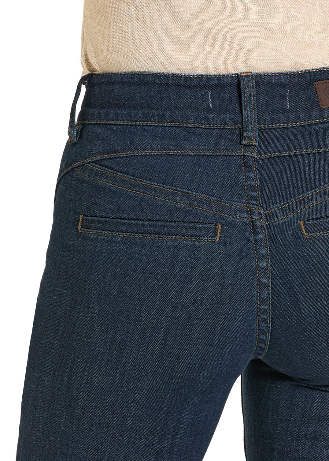 Close-up of the back of a person wearing Rock & Roll Denim High Rise Welt Trouser Jeans in dark blue with double welt pockets, visible stitching, and a beige shirt, highlighting Western-inspired sophistication.