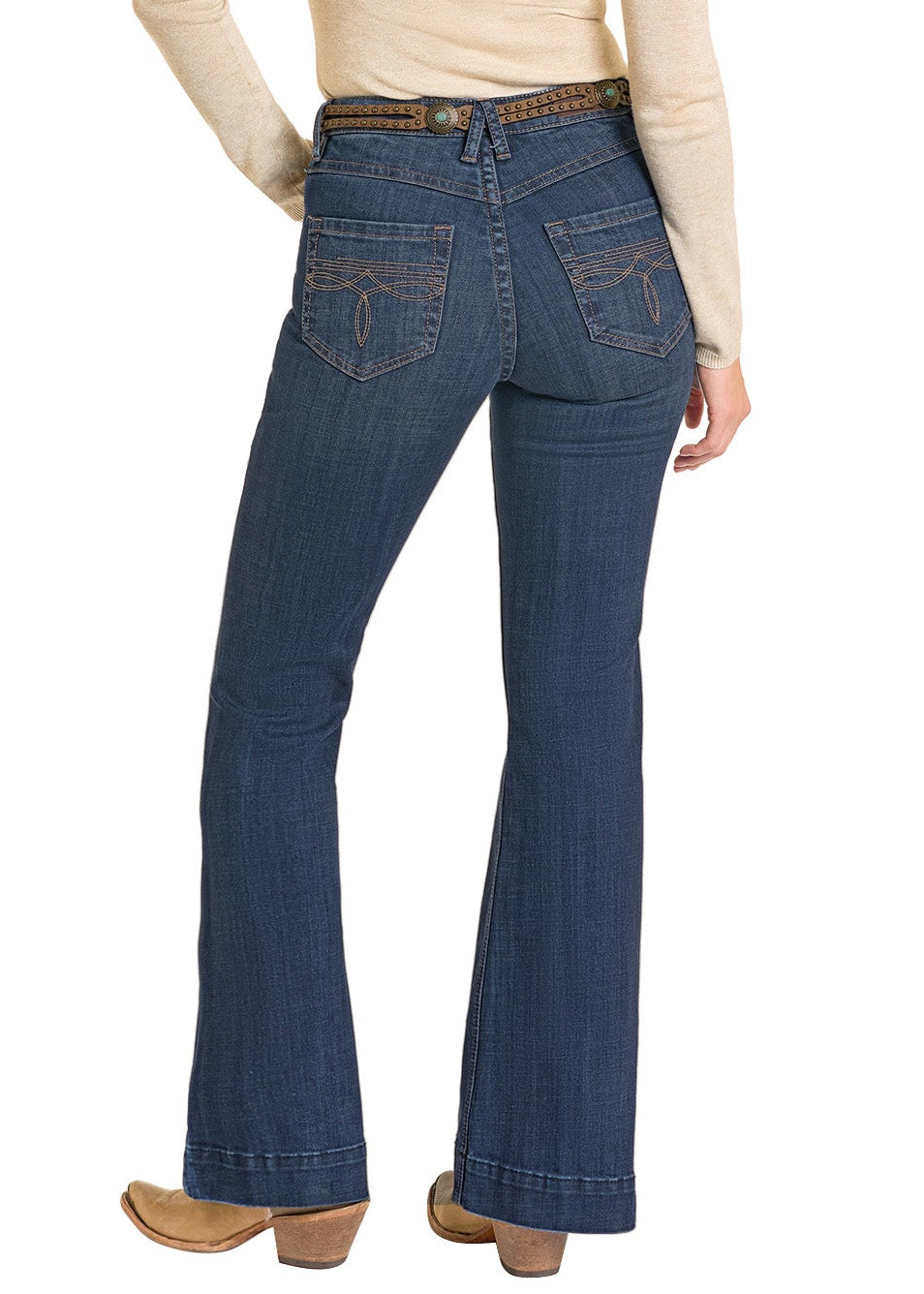 Person wearing blue jeans and a beige top with a brown cowboy hat on a white background