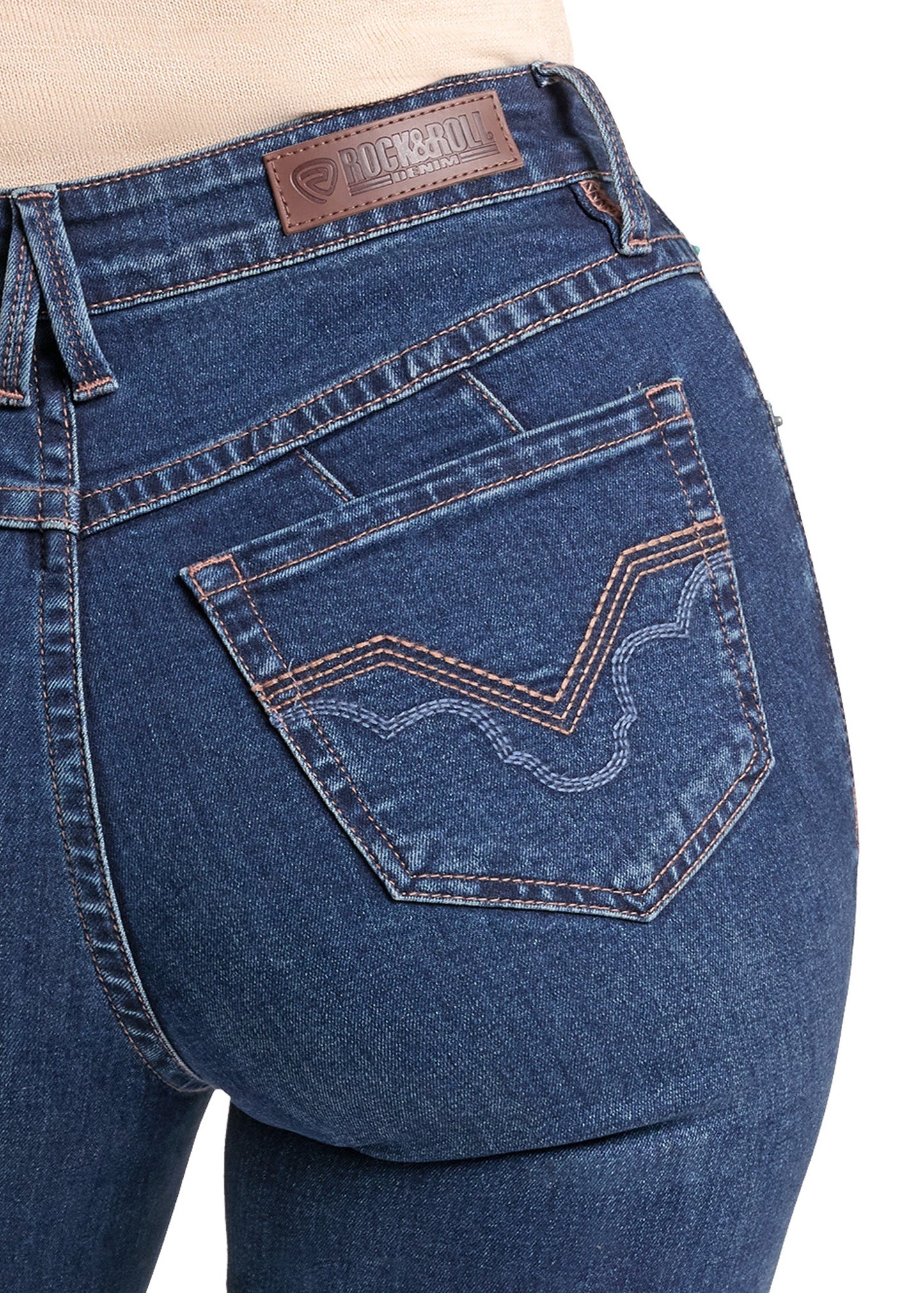 Close-up of the back waistband and rear pocket of blue denim jeans, showing a brown leather Hanes brand patch and decorative contrast stitching.