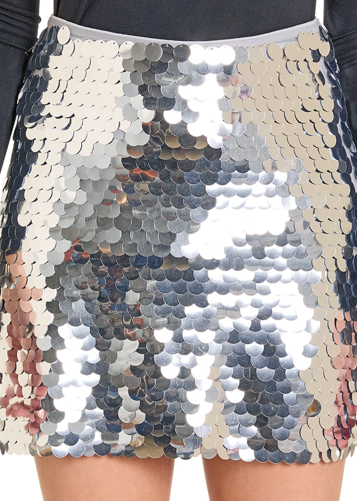 Close-up of a sequined skirt with a reflective surface