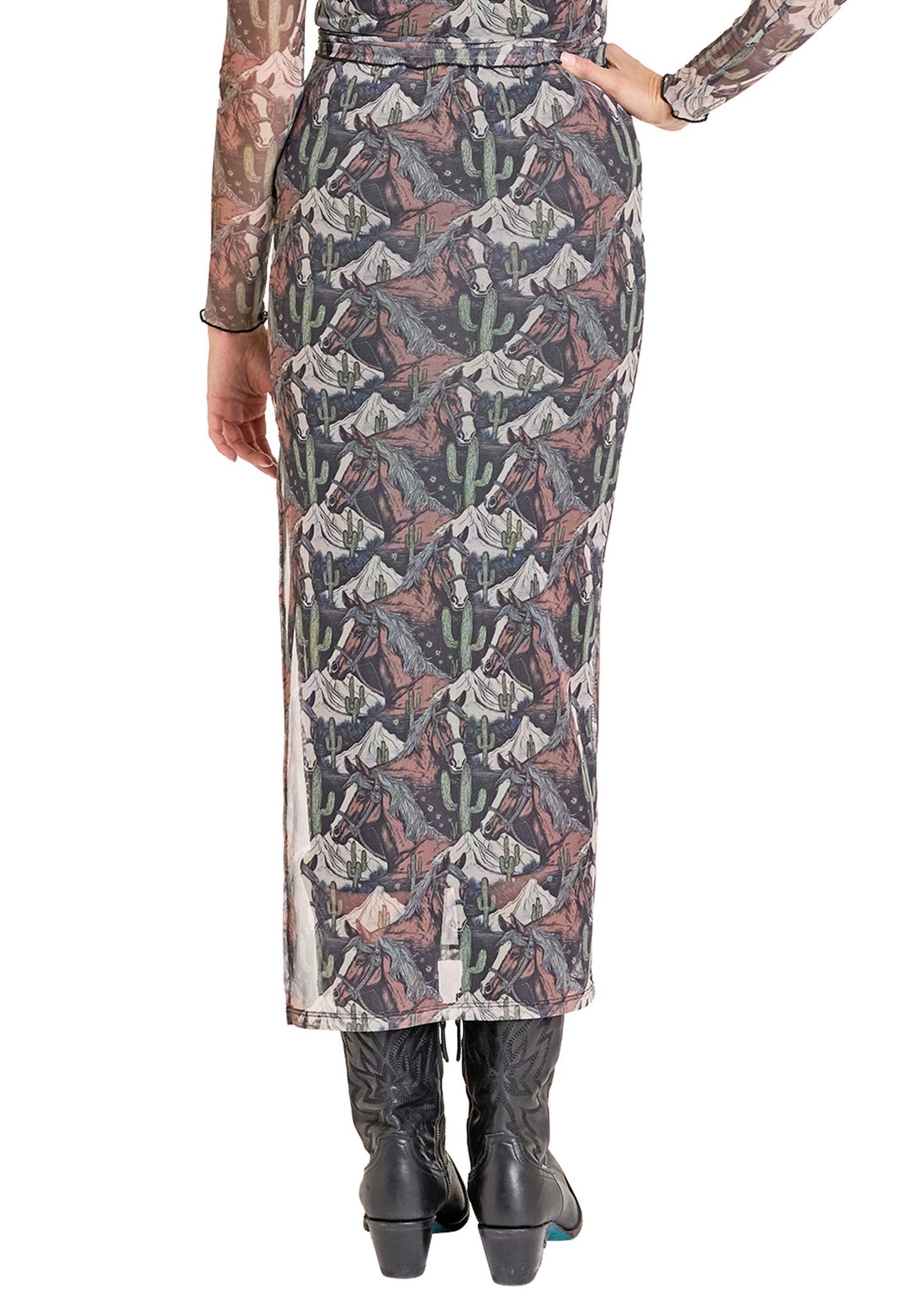 Long patterned skirt worn by a person on a white background