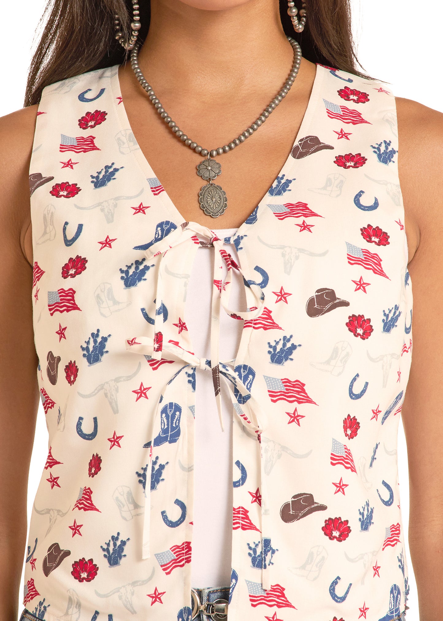 Woman wearing a sleeveless top with patriotic pattern