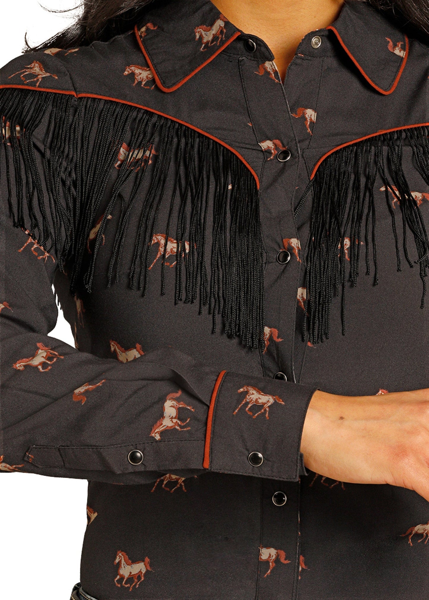 Black fringed shirt with horse patterns on a plain background