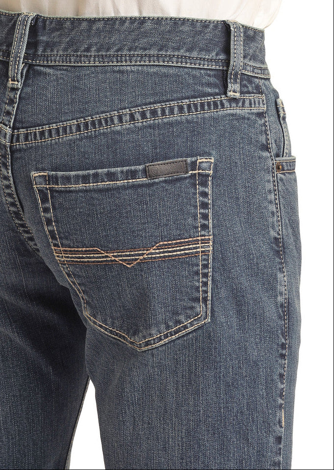 A person is shown from the waist down wearing Rock & Roll Denim's Vintage '46 Slim Fit Ivory Stitch Straight Leg Jeans with a tucked-in white shirt, highlighting the back pockets of the jeans.