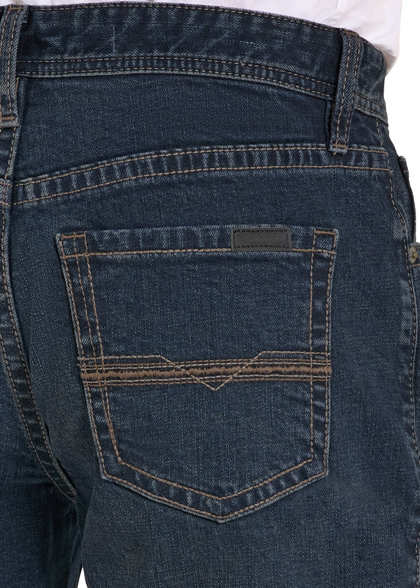 Close-up of blue jeans with a pocket on a white background