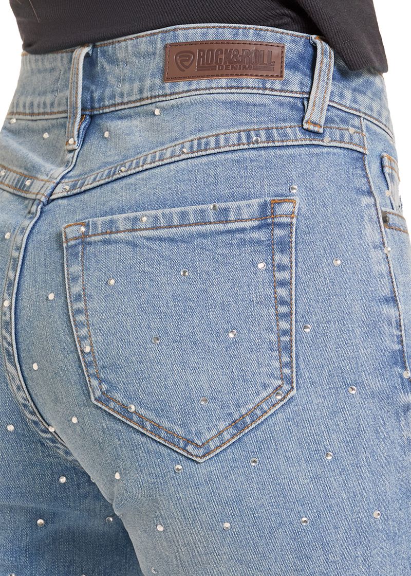 Detailed image of the back pocket on a pair of women's light wash rhinestone jeans.