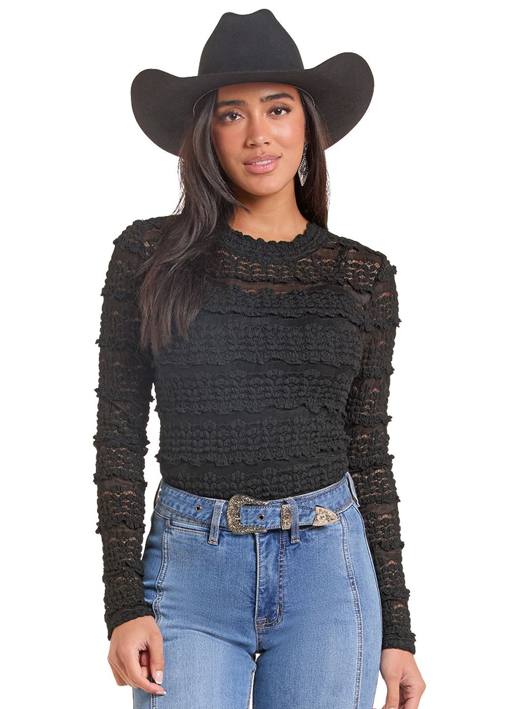Woman in a long sleeve black lace top.
