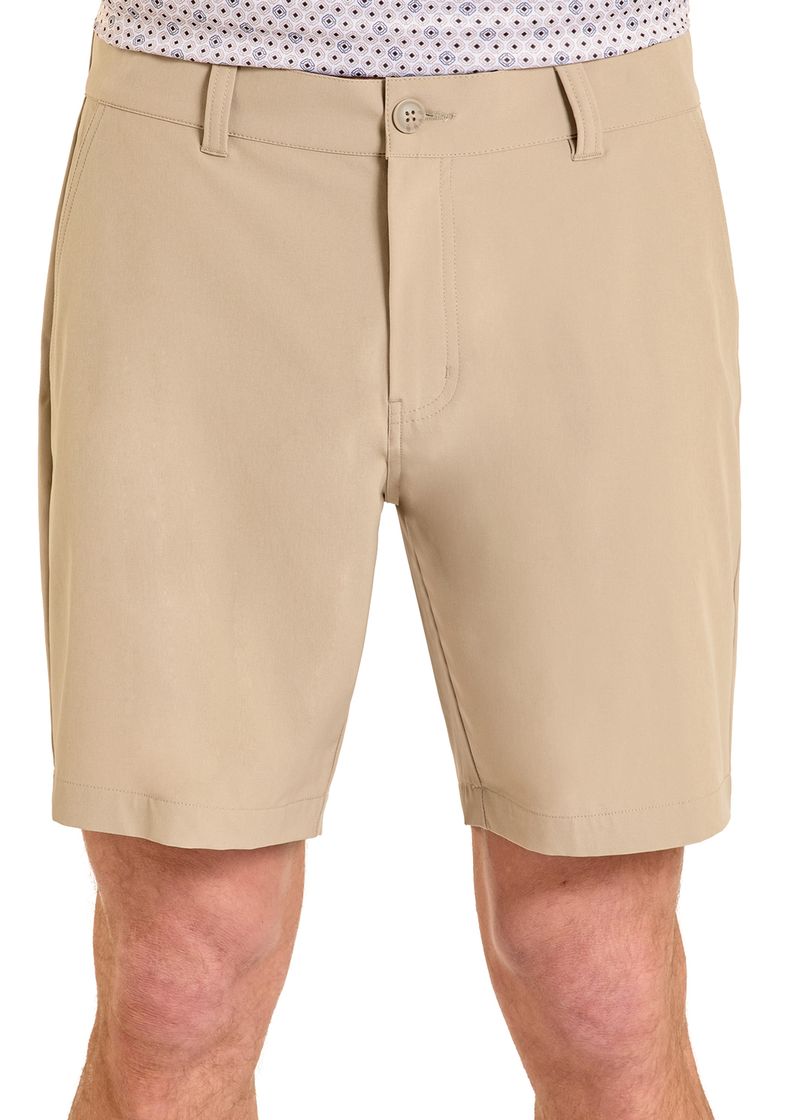 Beige shorts worn by a person on a white background