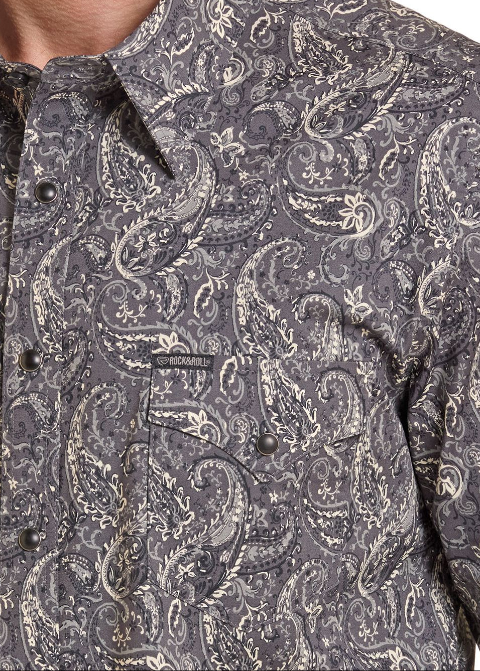 Shoulder detail of Black Paisley Long Sleeve Snap Shirt with chest pocket.
