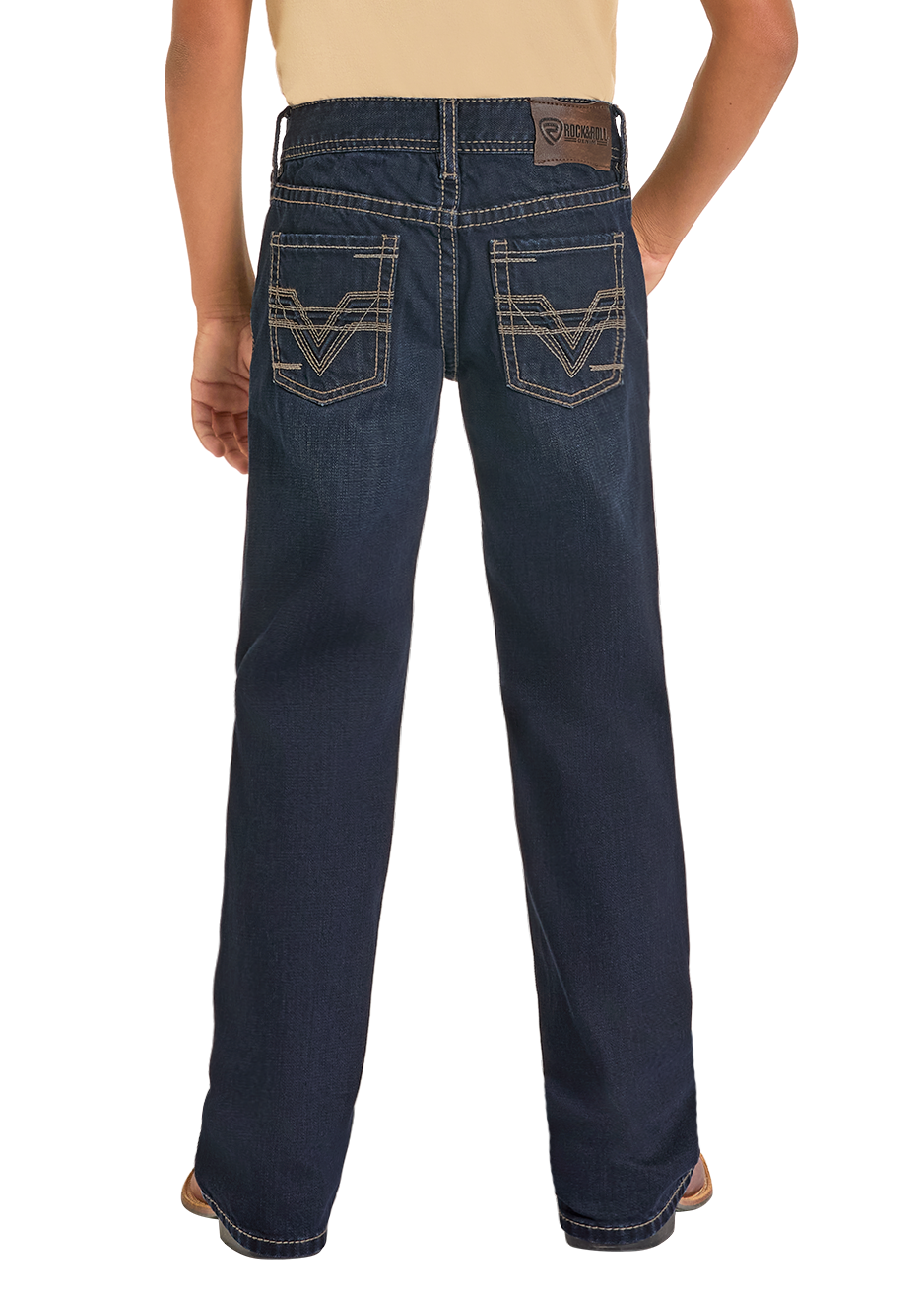 Person wearing a black cowboy hat, beige shirt, and dark blue jeans on a white background