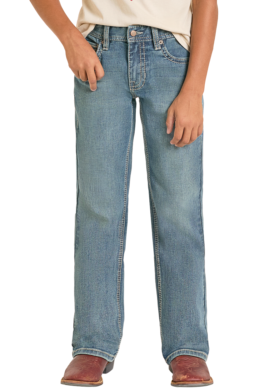 Child wearing a cowboy hat, t-shirt, and jeans on a white background