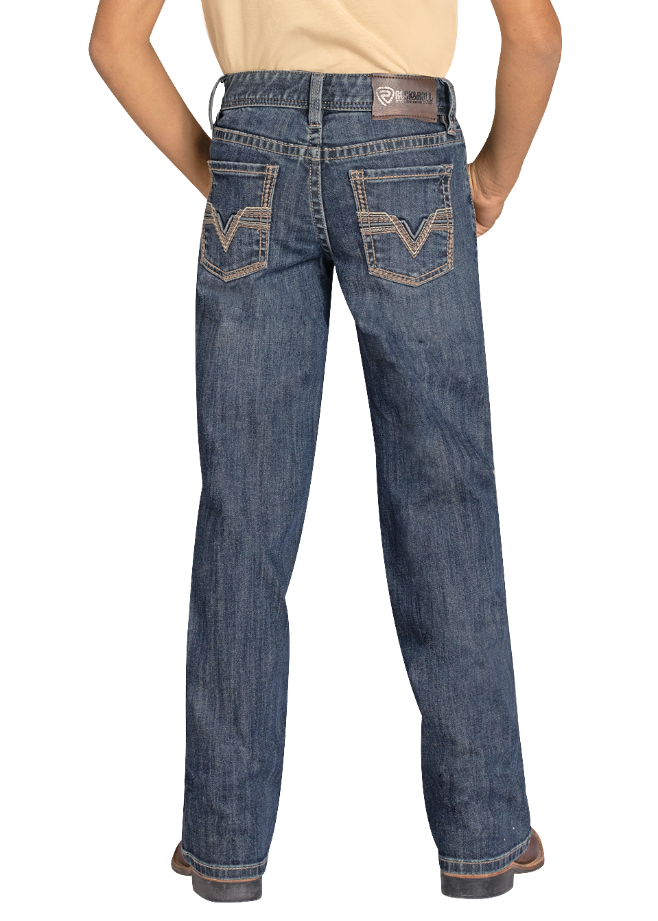 Child wearing a black cowboy hat, beige shirt, and blue jeans on a white background