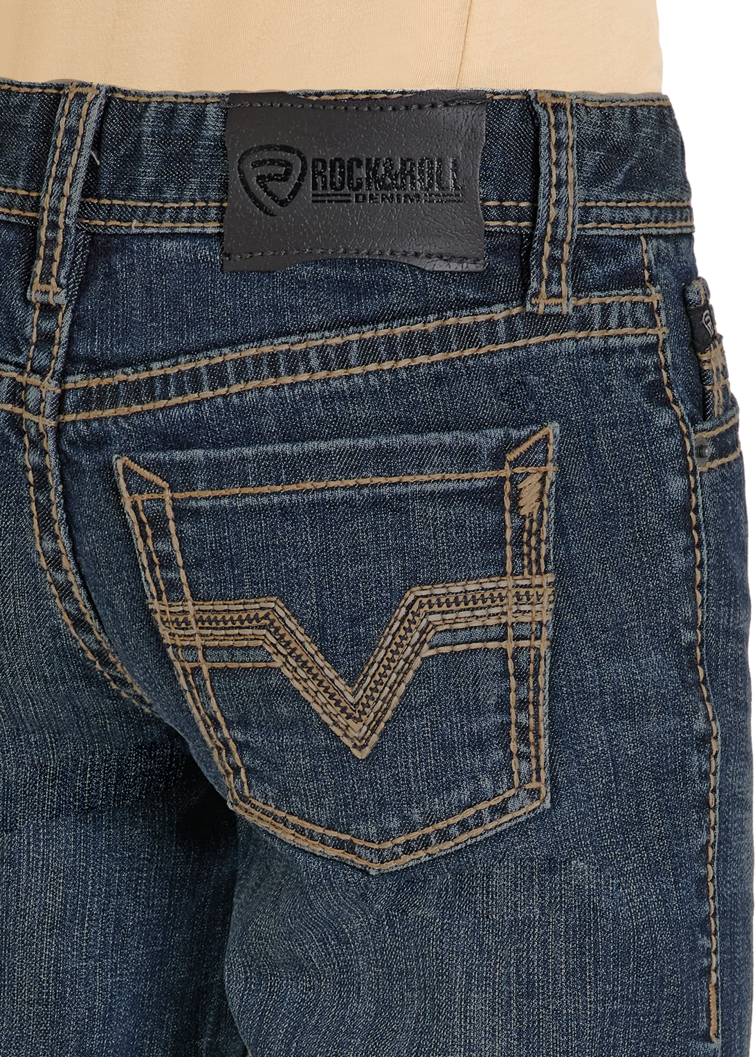 Blue jeans with a brand label on the back pocket against a white background
