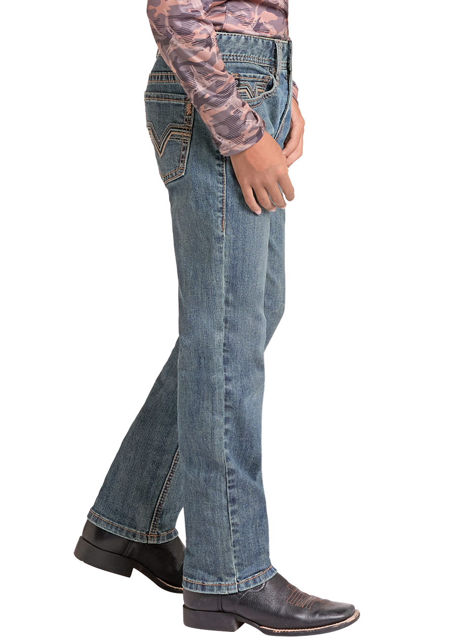 A child model wearing a brown and beige camouflage patterned long-sleeve hoodie, blue jeans, a black cowboy hat, and black boots, shown in profile against a solid white background.
