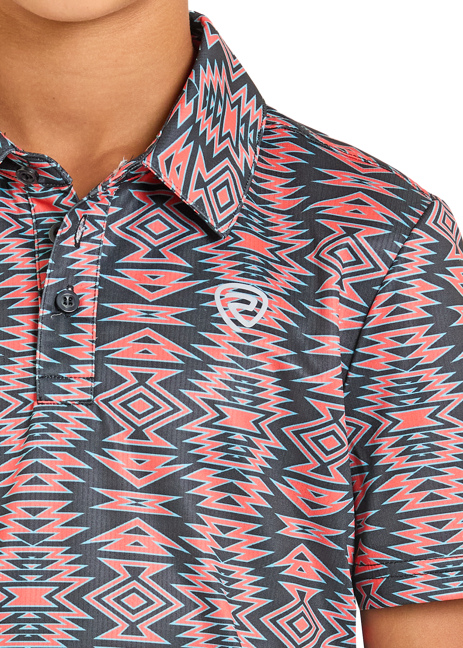 Close-up of a patterned shirt with geometric design in red and black on a white background