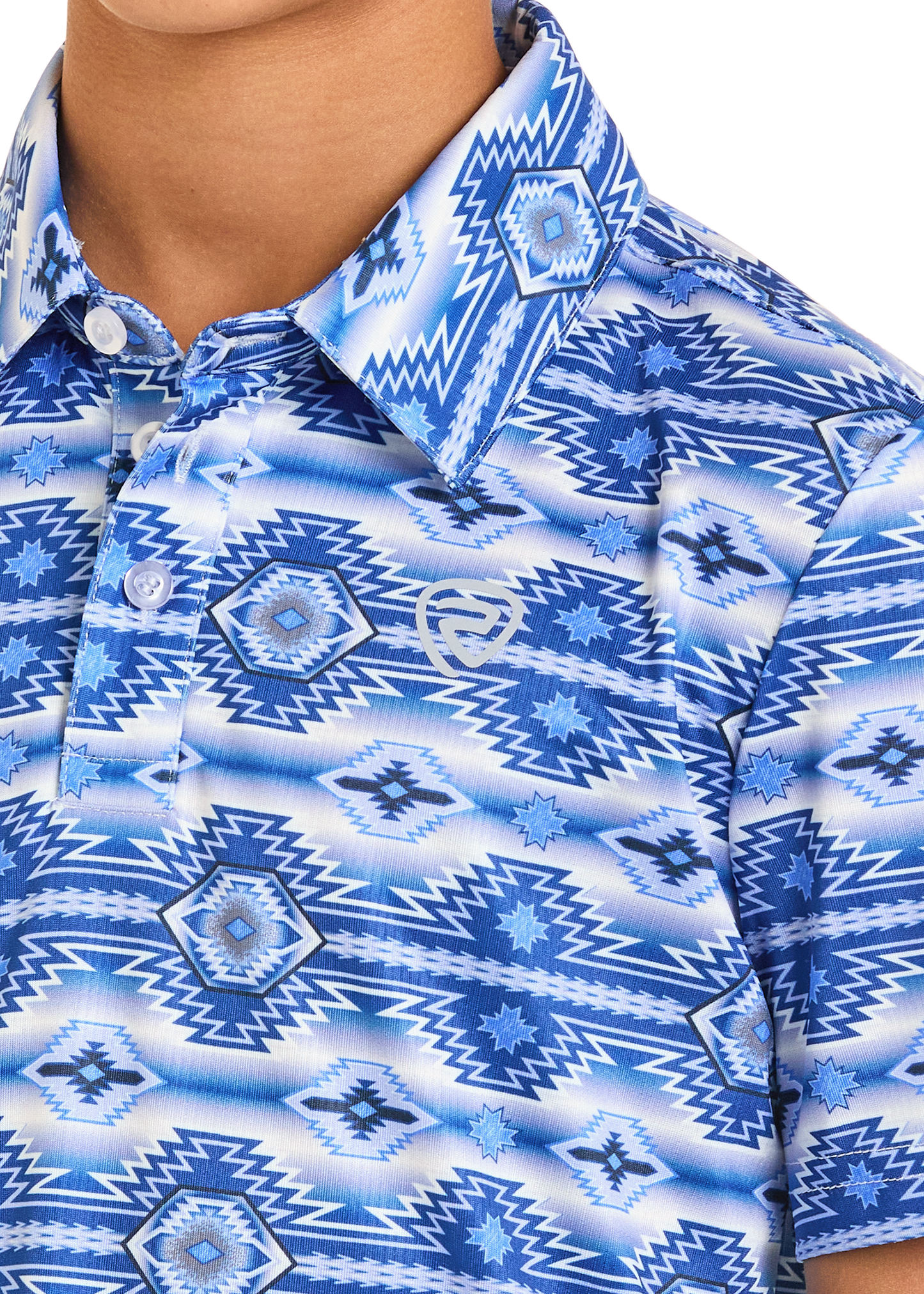 Close-up of a blue and white patterned shirt with a collar.