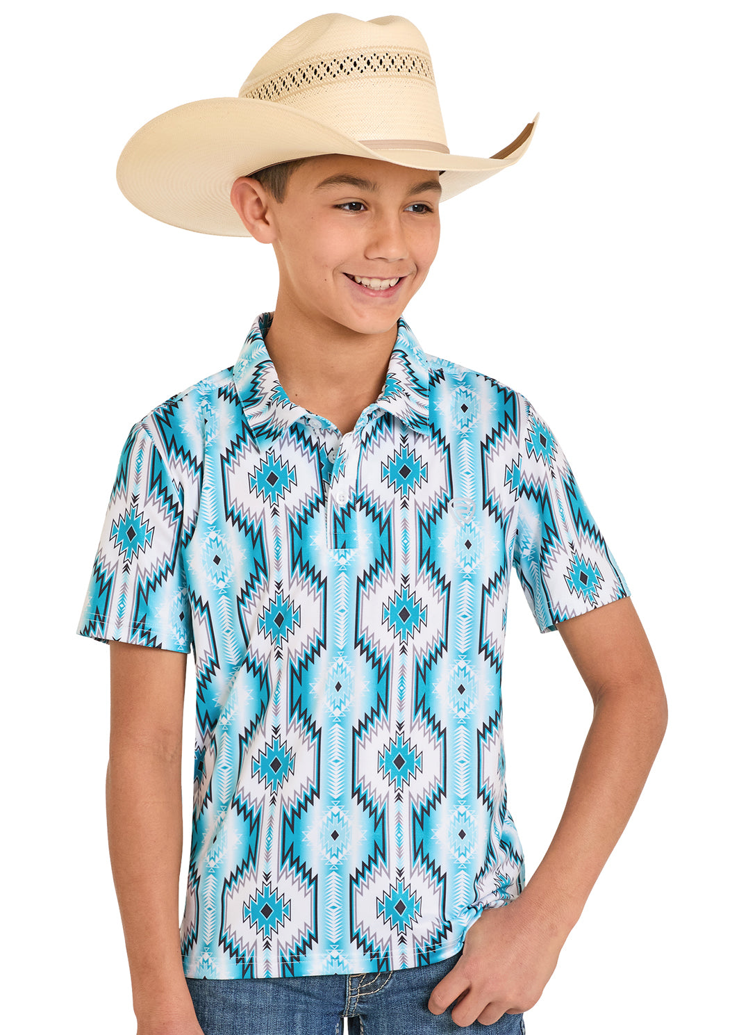 Child wearing a blue aztec patterned shirt and cowboy hat on a white background