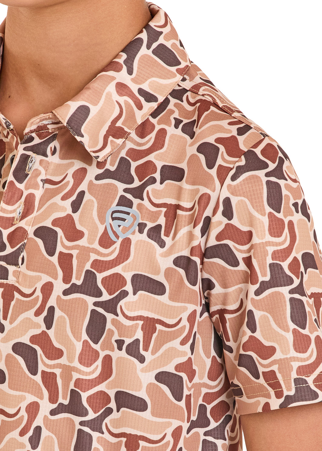 Close-up of a camouflage-patterned shirt with a brand logo on a white background