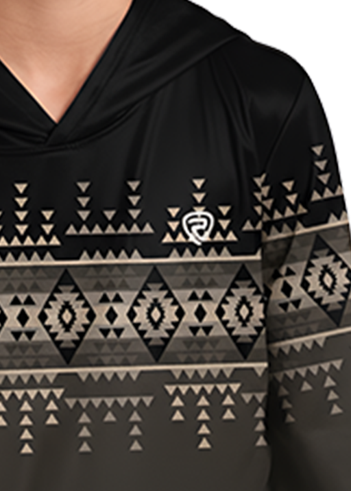 A young boy wearing a black long-sleeve hoodie with a beige geometric pattern across the chest and sleeves, paired with a black cowboy hat and blue jeans, set against a plain white background.