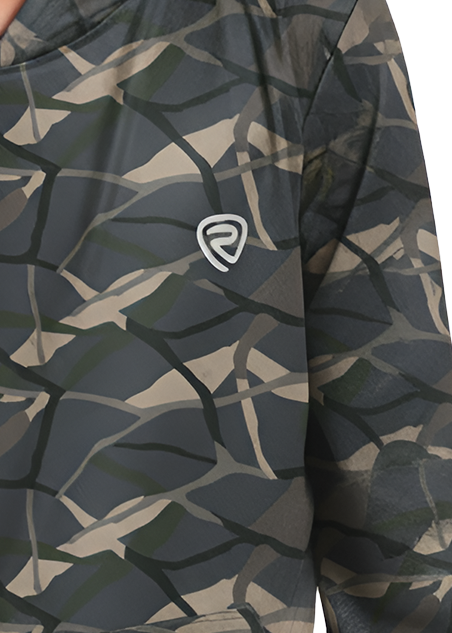 Close up of a boys dark camouflage patterned hoodie with a small white shield logo on the chest.