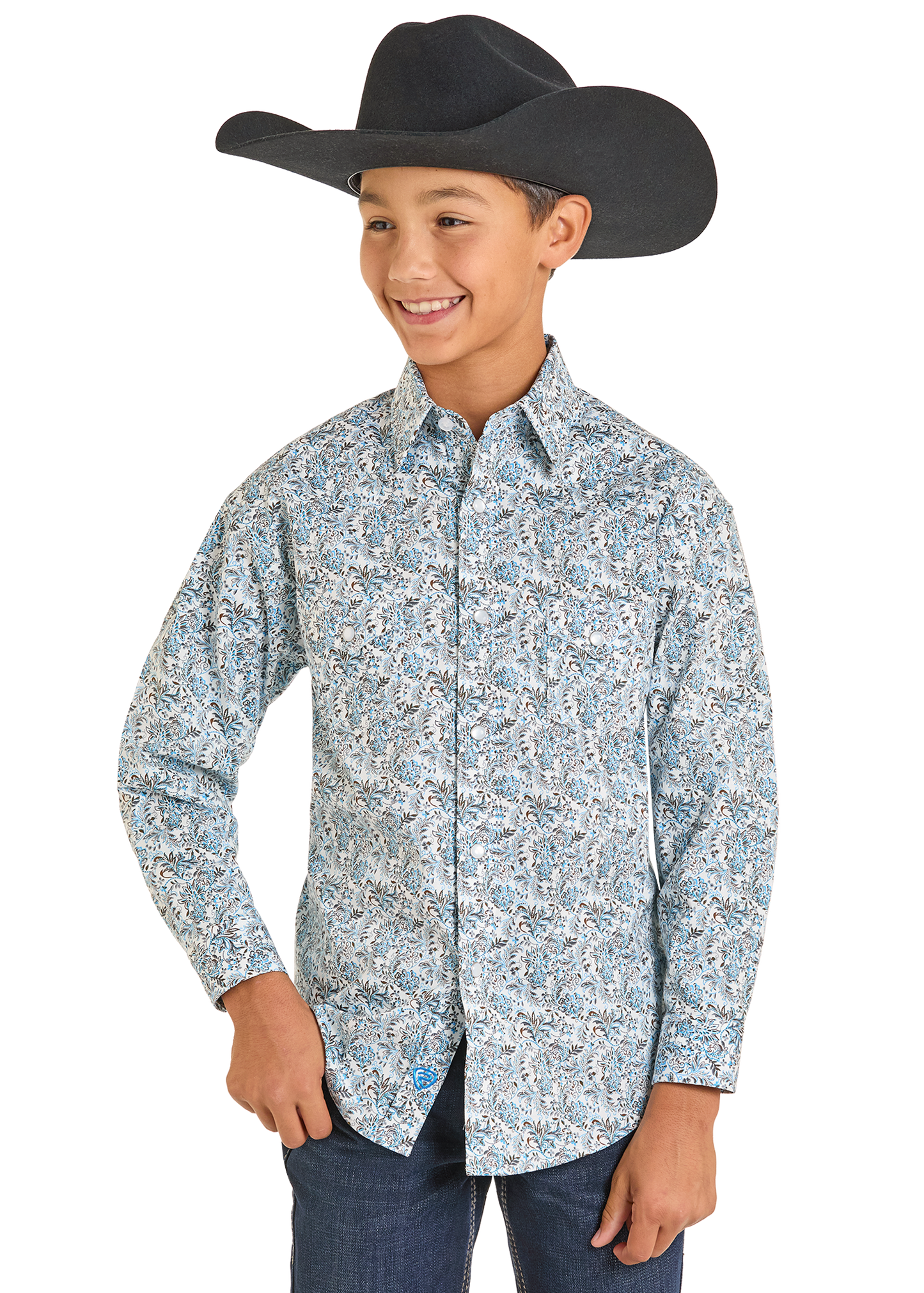Child wearing a patterned shirt and cowboy hat on a white background