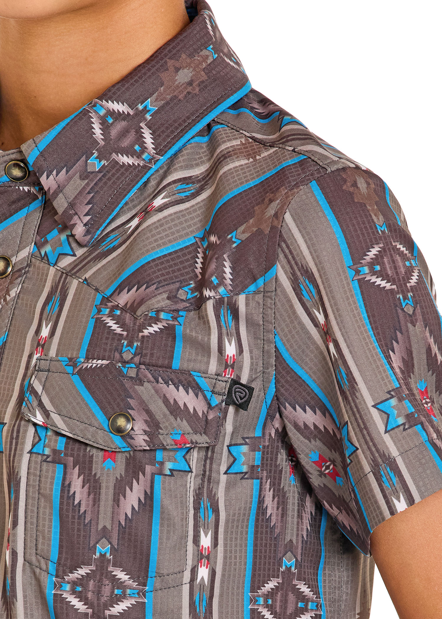 Close-up of a patterned shirt with geometric design