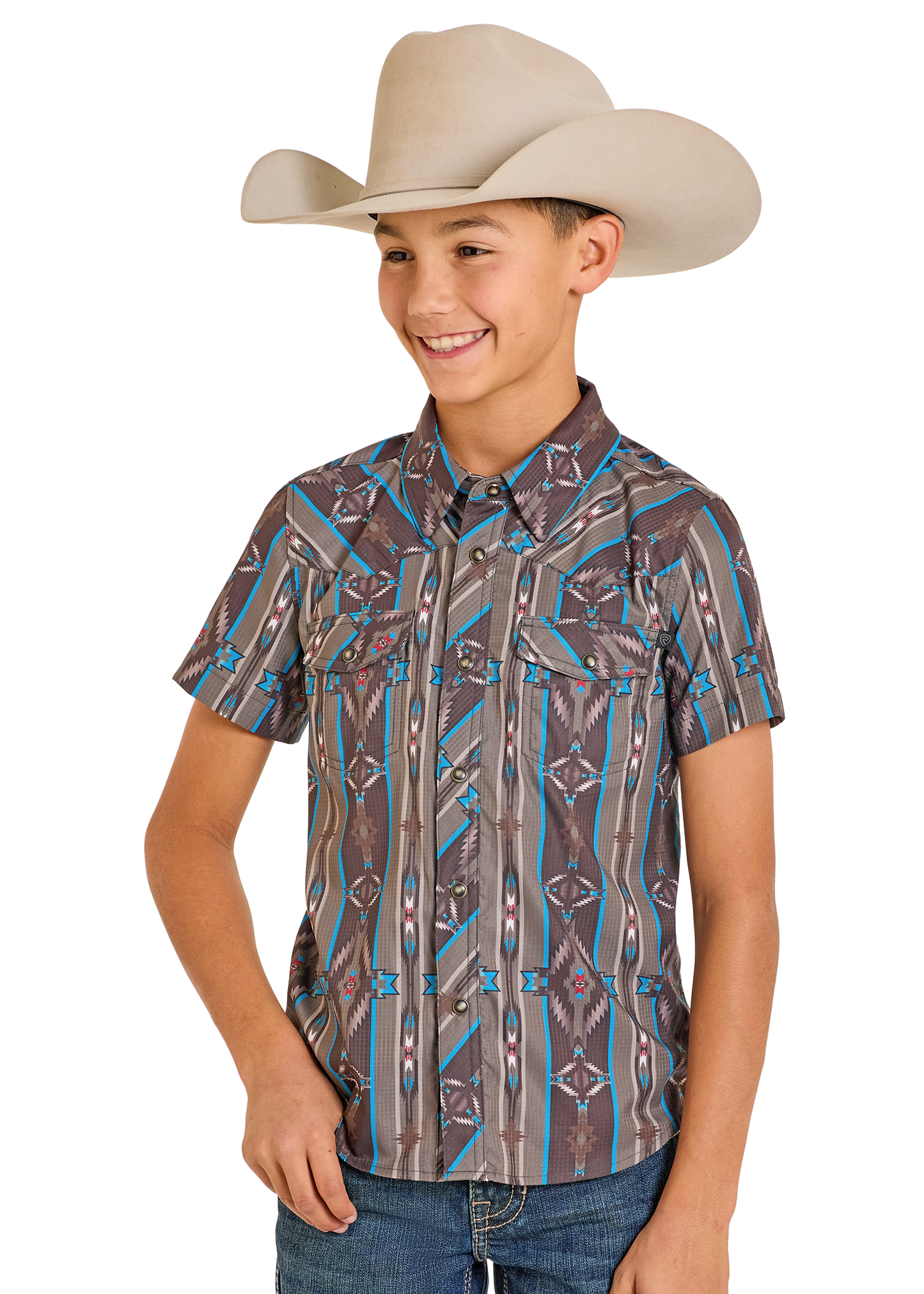 Child wearing a patterned shirt and cowboy hat on a white background