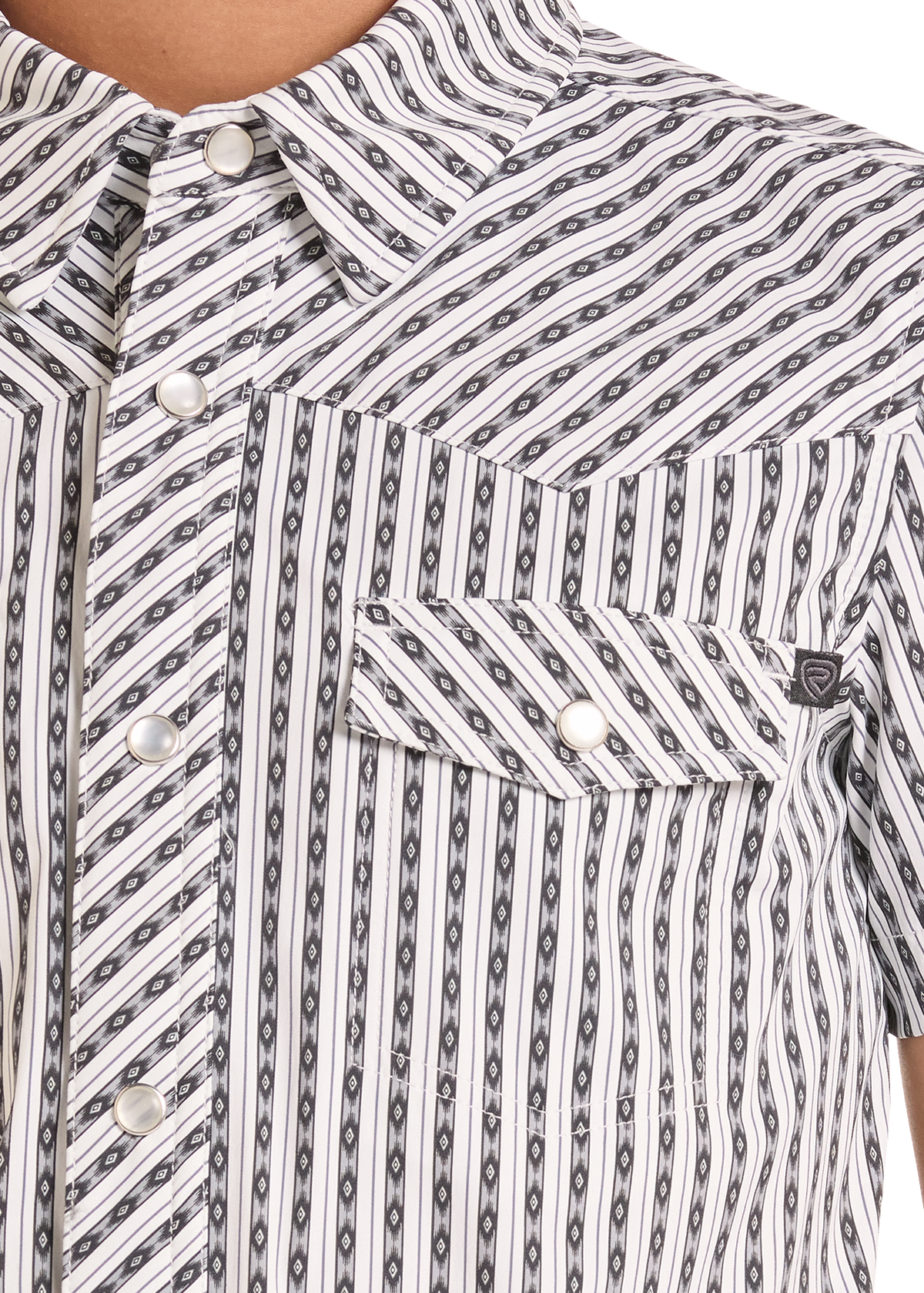 Close-up of a short-sleeve western-style button-up shirt with a white base, black and gray diagonal stripe pattern, and a chest pocket with two buttons.