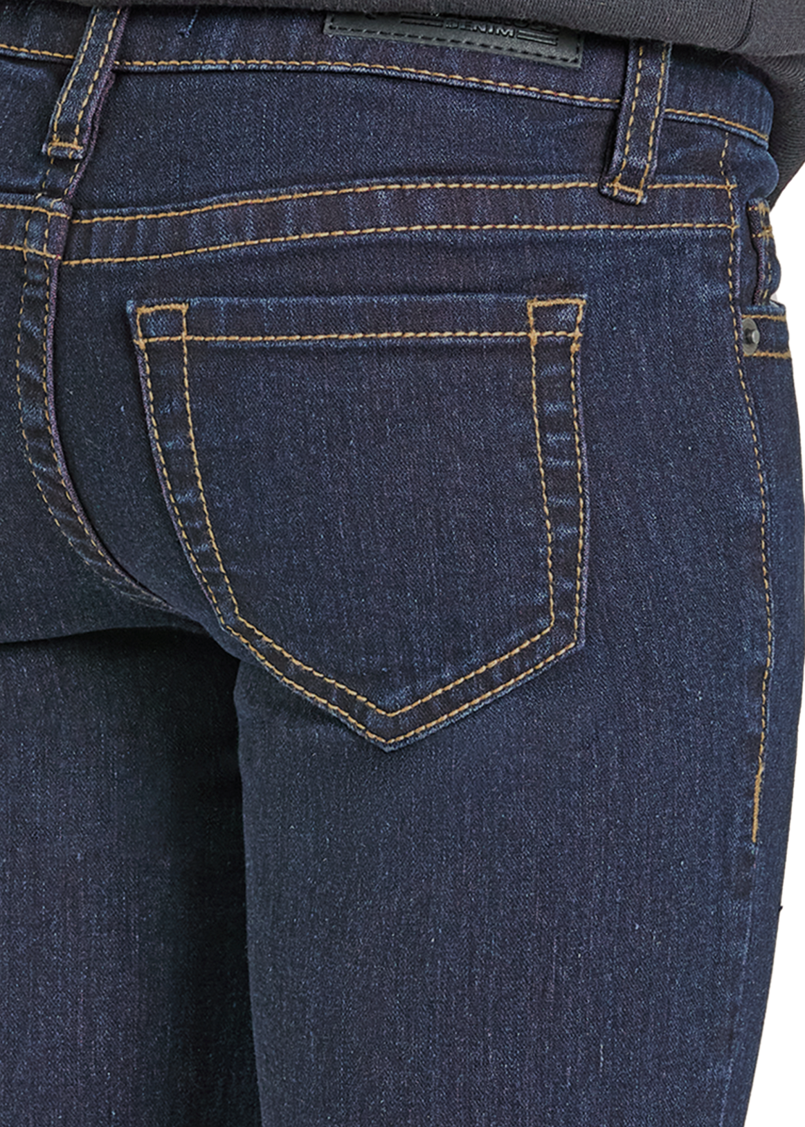 Close-up of blue jeans with a white background