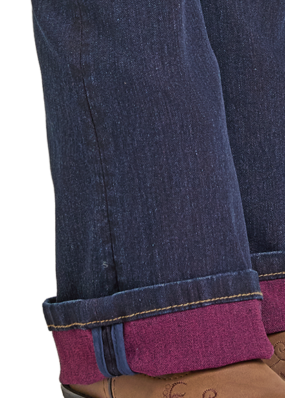 Person wearing blue jeans with a white background