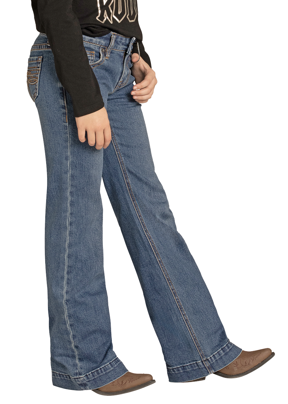 Child wearing a cowboy hat, black shirt with text, and blue jeans on a white background