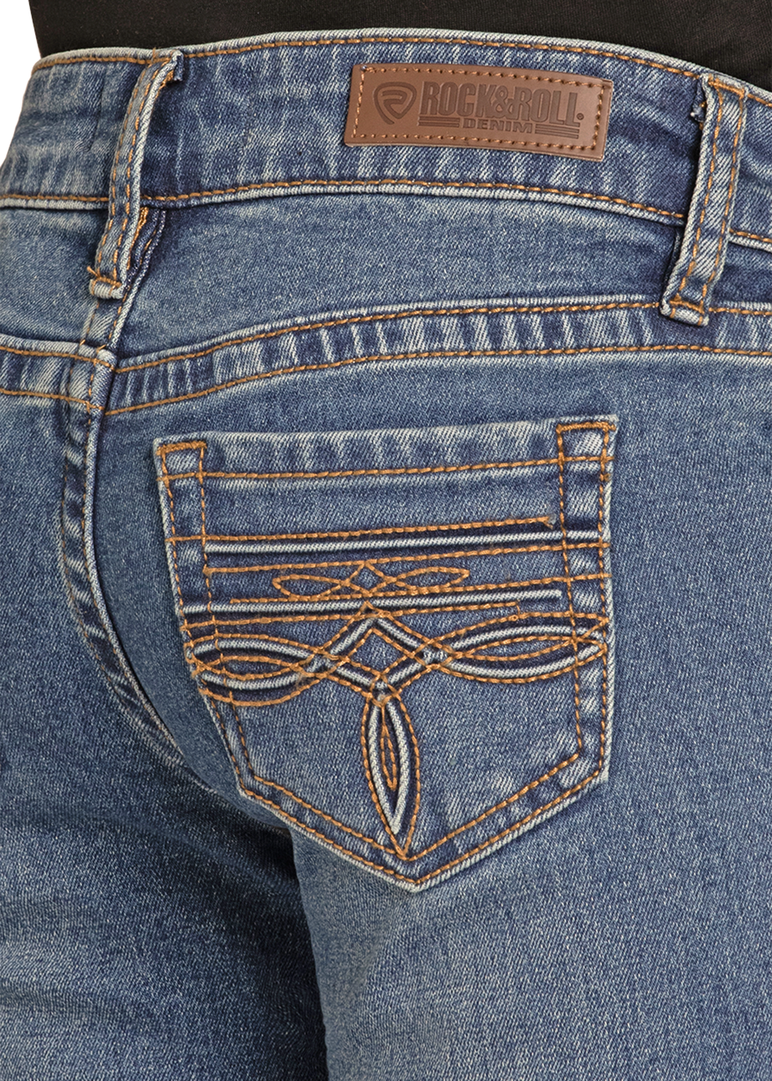 Close-up of blue jeans with a brand label on the back pocket.