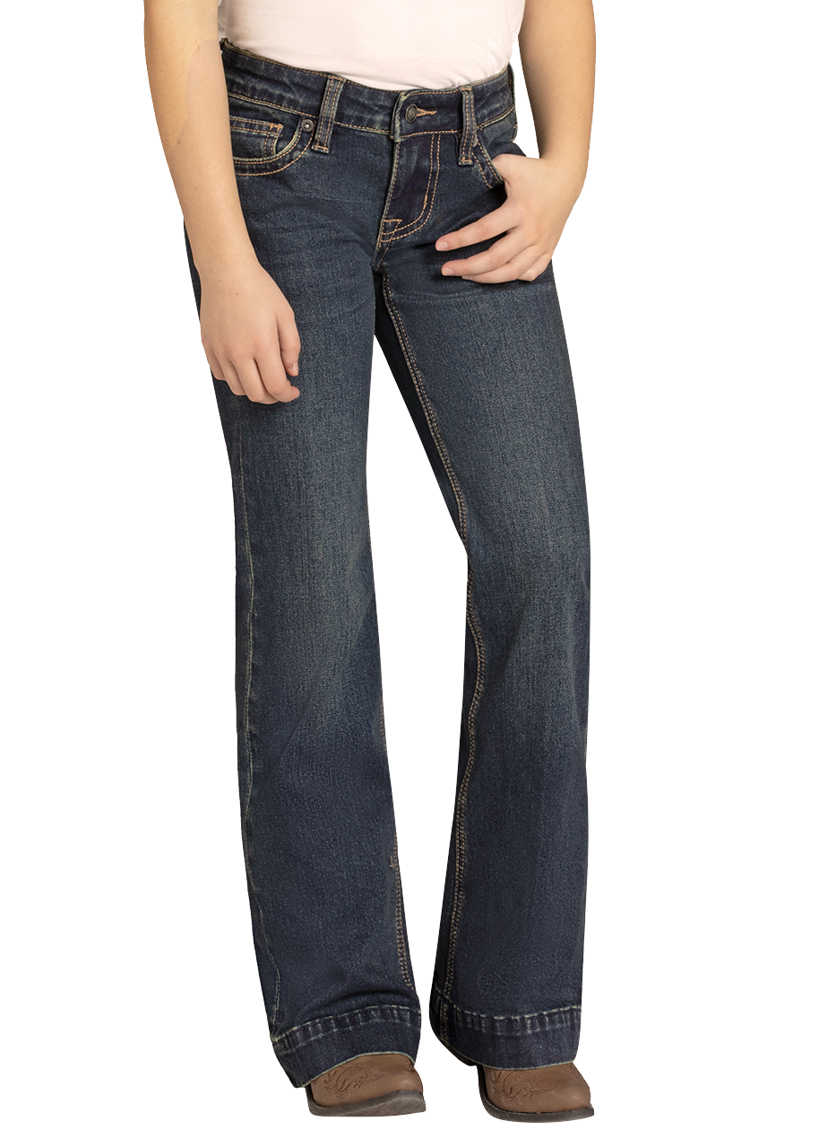 Person wearing a cowboy hat, white shirt, and blue jeans on a white background