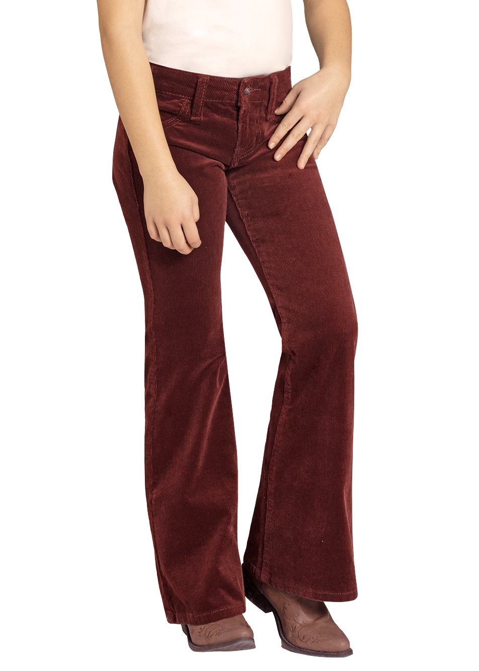 Young girl wearing a white shirt, red pants, and a beige cowboy hat on a white background