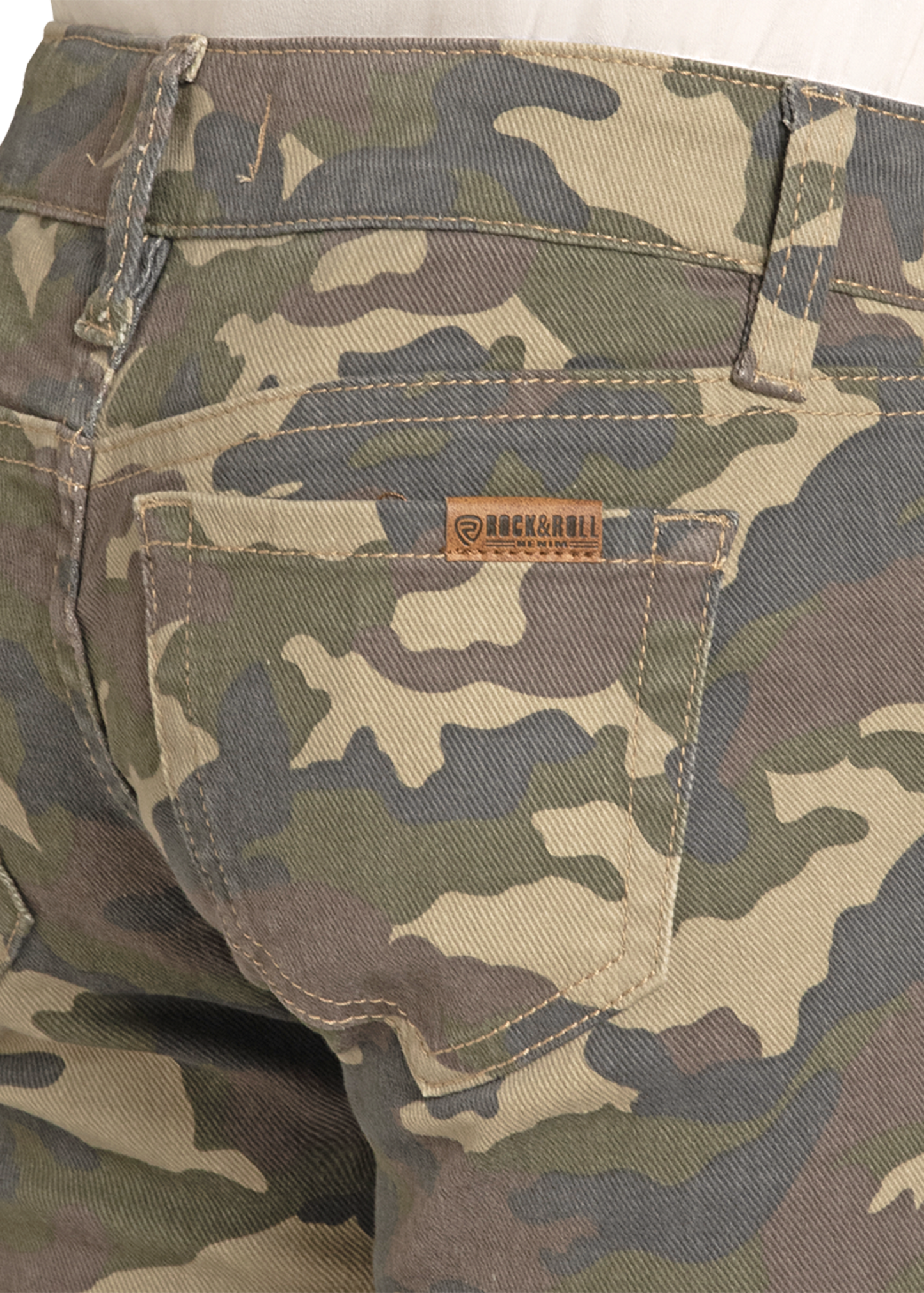 Camouflage pants with a brand label on the pocket