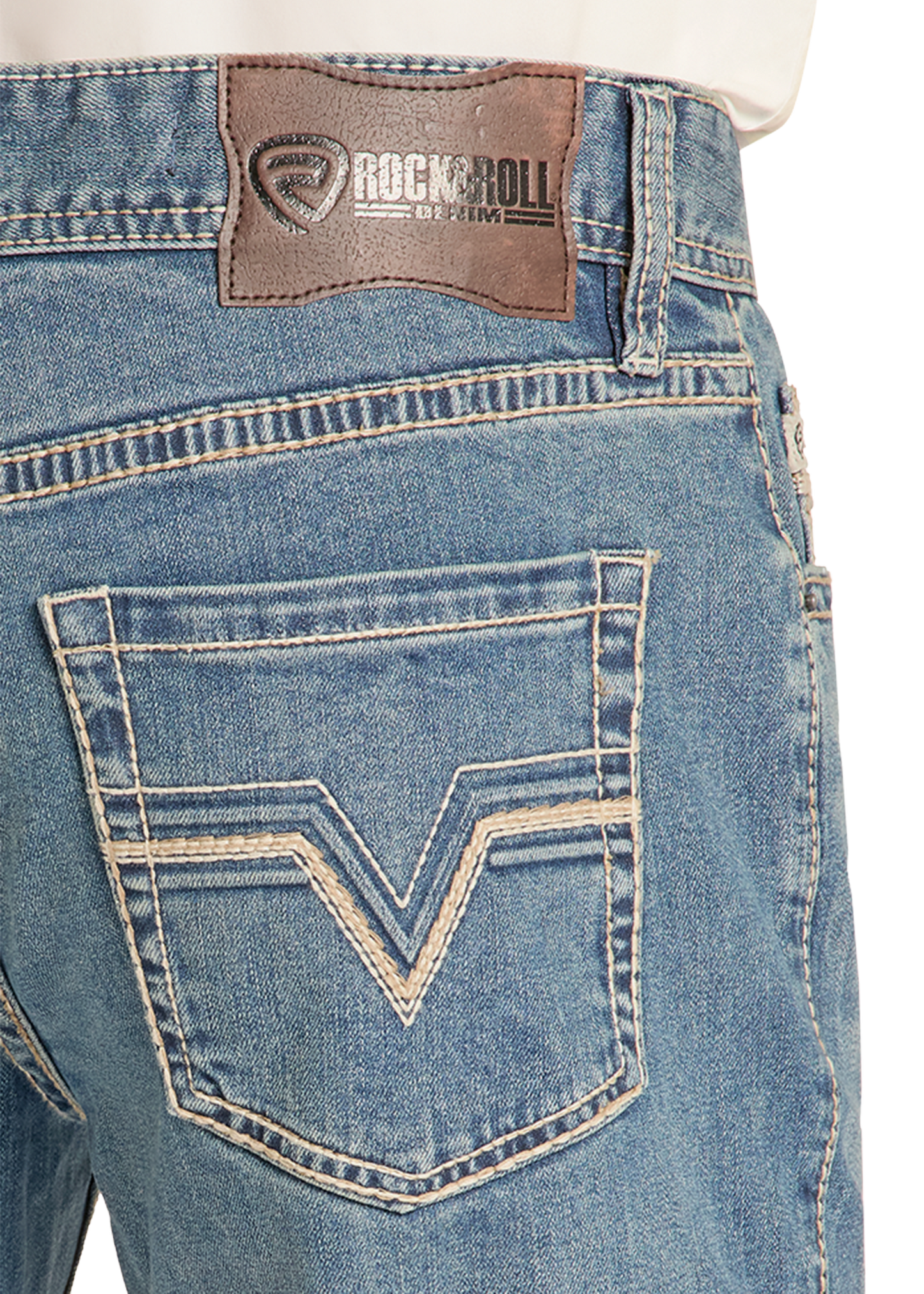 Close-up of blue jeans with a brand patch on the pocket