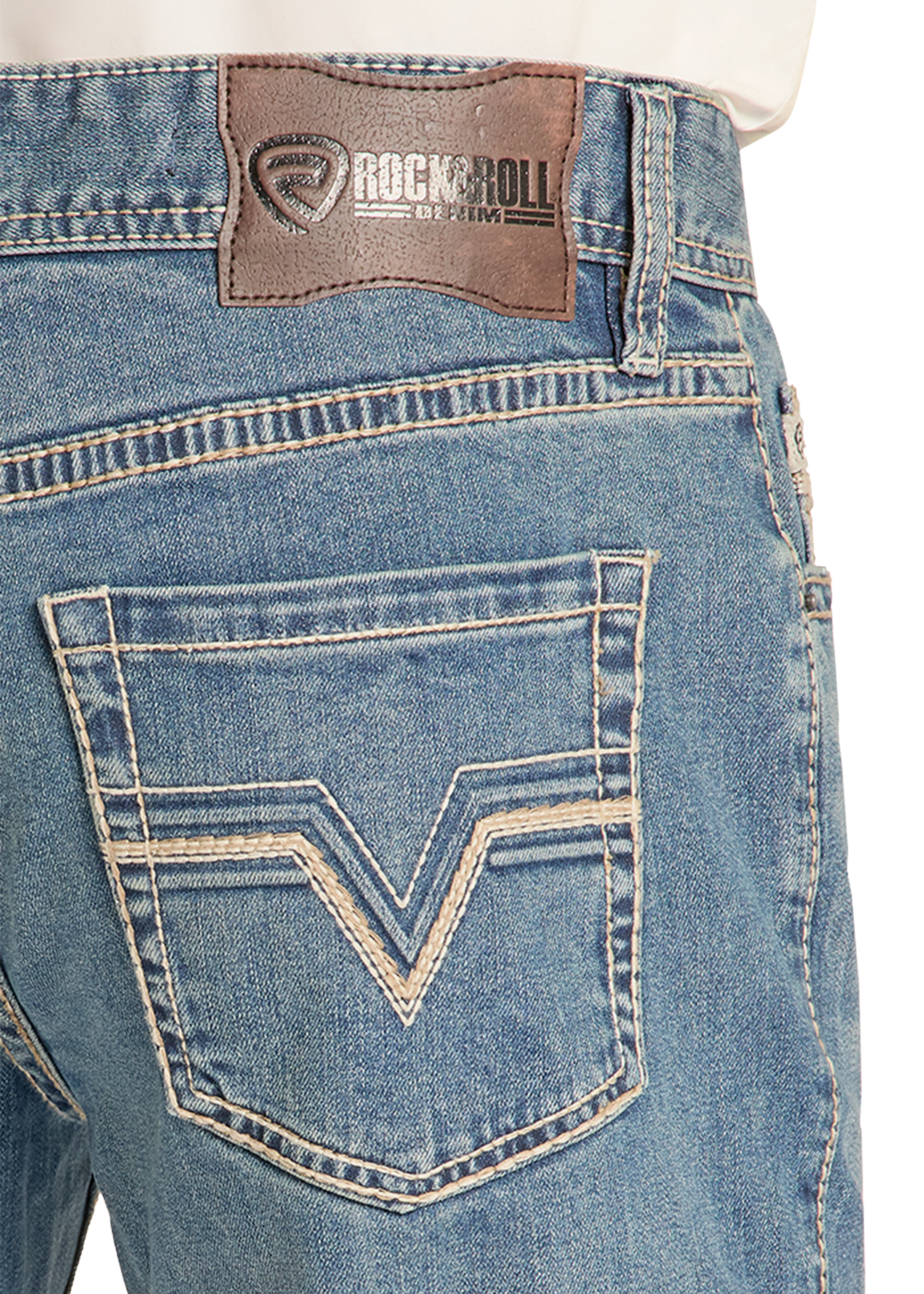 Close-up of blue jeans with a brand patch on the pocket
