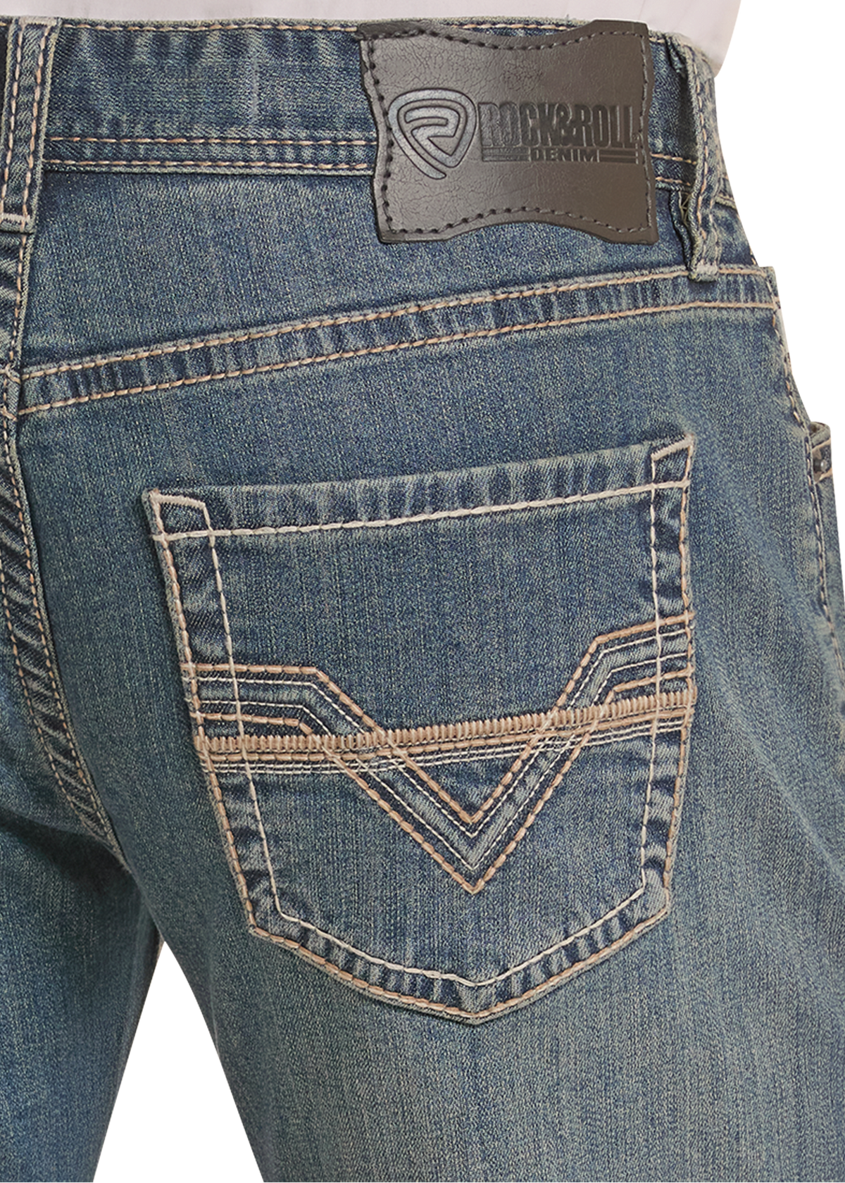 Detail of a men's stitched pocket on jeans. 