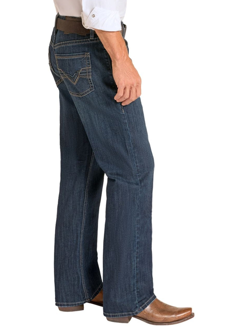 Man wearing a white shirt, blue jeans, and cowboy boots on a white background