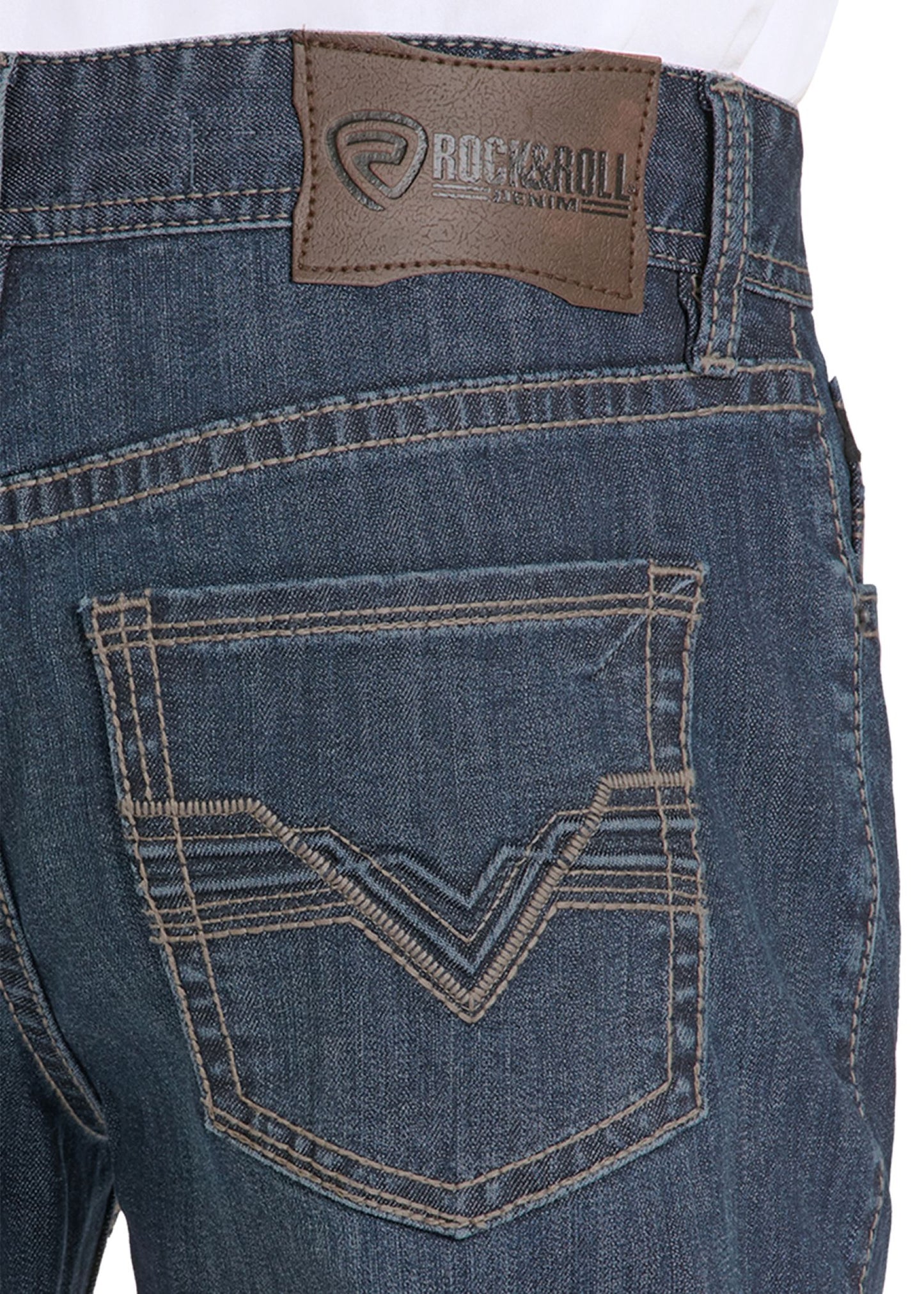 Close-up of blue jeans with a brand label on the back pocket.