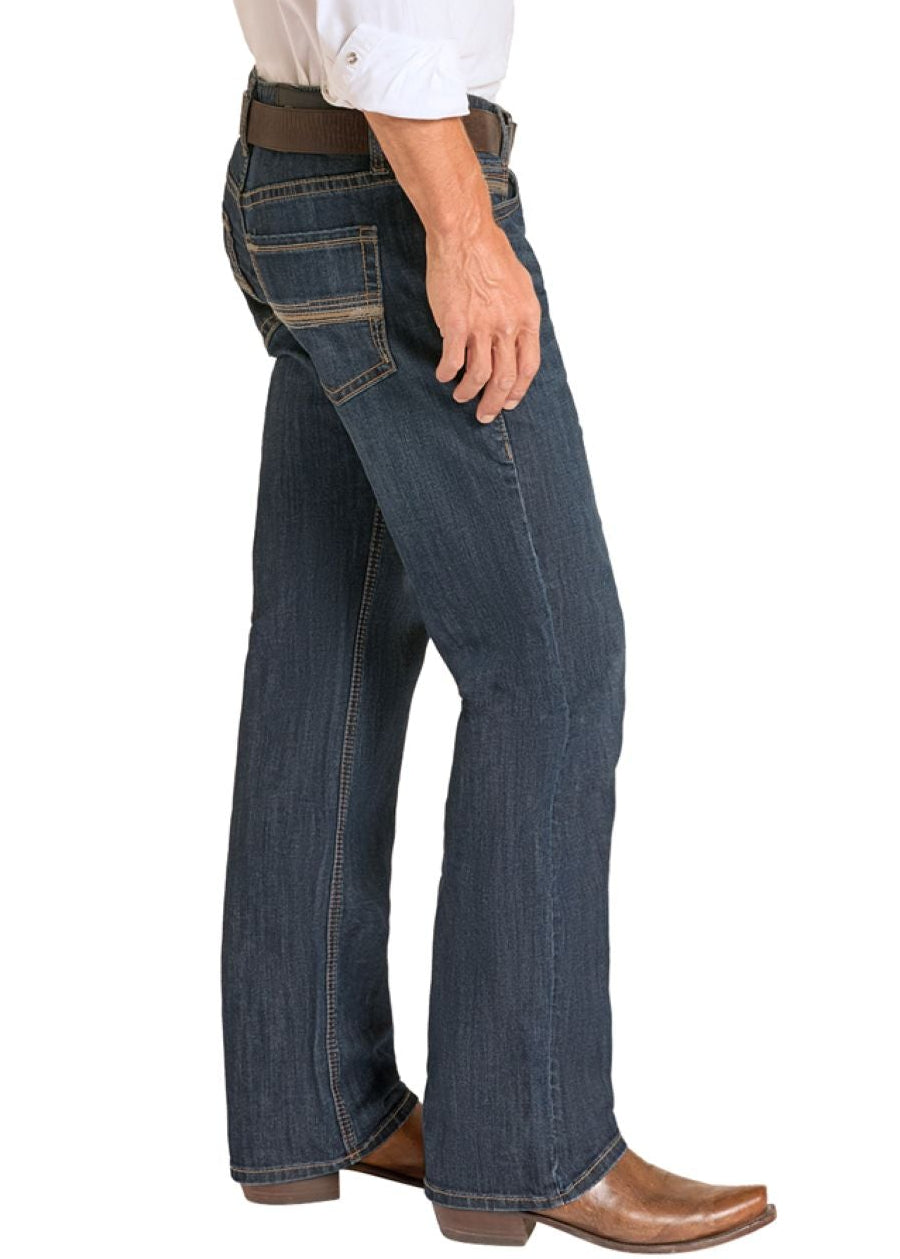 Man wearing a white shirt, blue jeans, and cowboy boots on a white background