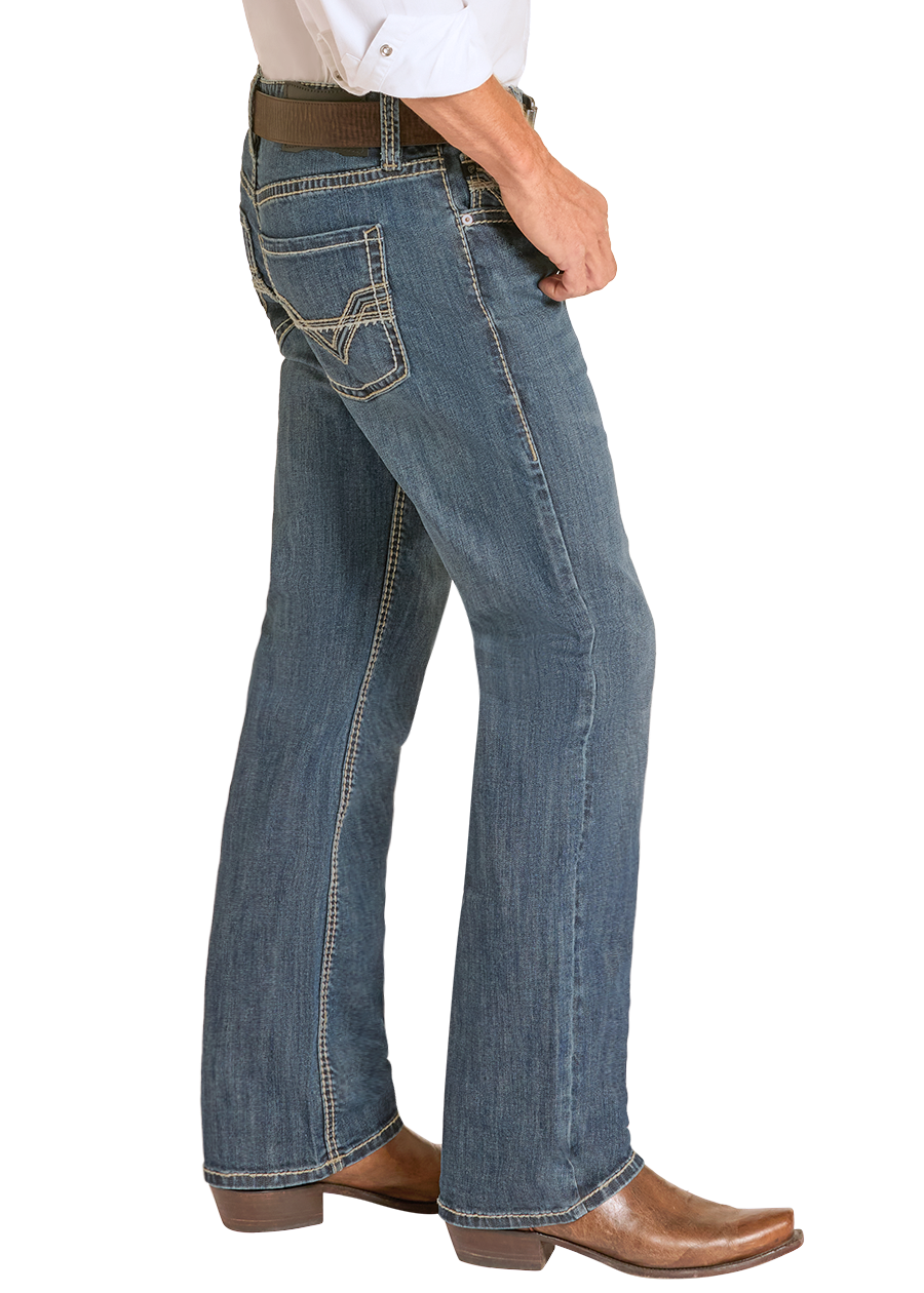 Man wearing Rock & Roll Denim jeans with a white shirt and boots. 